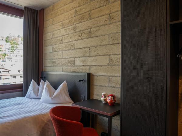 Tailormade Hotel LEO St Gallen : photo 5 de la chambre cosy queen (13qm)