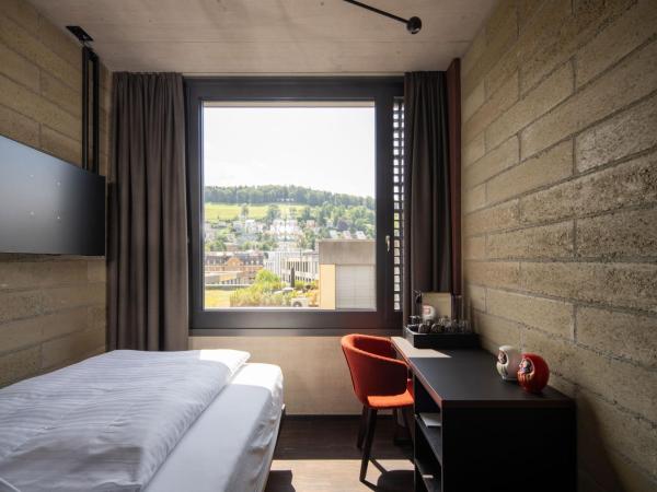 Tailormade Hotel LEO St Gallen : photo 1 de la chambre cosy queen (13qm)