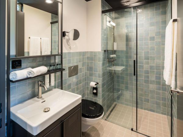 Tailormade Hotel LEO St Gallen : photo 5 de la chambre hébergement lit king-size classique