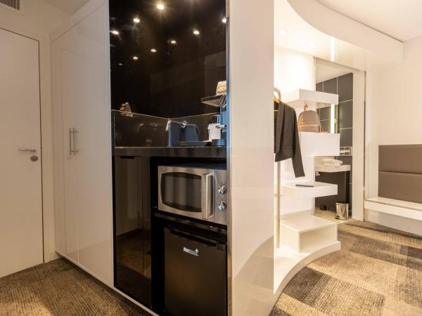 Novotel Suites Paris Expo Porte de Versailles : photo 7 de la chambre suite supérieure avec lit double et canapé-lit