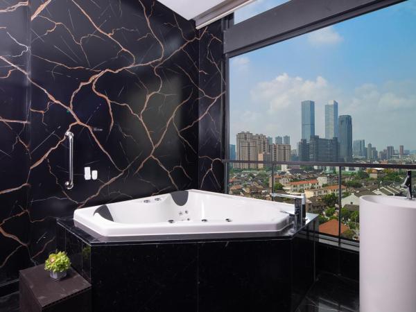 Rocase Boutique Hotel Wuxi : photo 4 de la chambre deluxe balcony suite 360° city resort