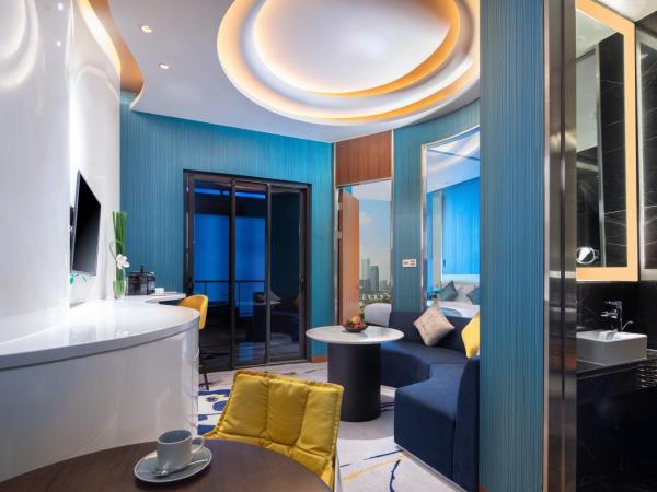 Rocase Boutique Hotel Wuxi : photo 3 de la chambre deluxe balcony suite 360° city resort