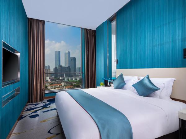 Rocase Boutique Hotel Wuxi : photo 2 de la chambre deluxe balcony suite 360° city resort