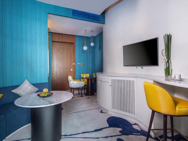 Rocase Boutique Hotel Wuxi : photo 1 de la chambre deluxe balcony suite 360° city resort