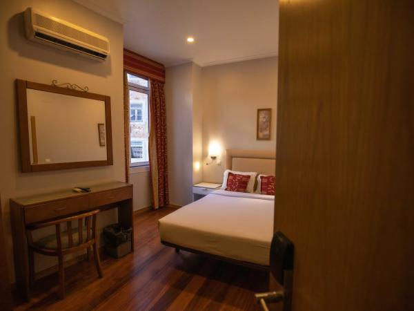 Grande Pensao Residencial Alcobia : photo 3 de la chambre chambre double