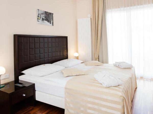 Hotel Sandwirth : photo 6 de la chambre suite avec balcon