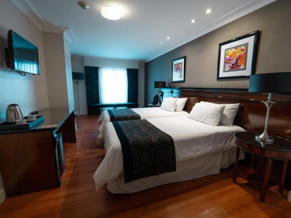 Amérian Executive Córdoba Hotel : photo 4 de la chambre chambre lits jumeaux deluxe