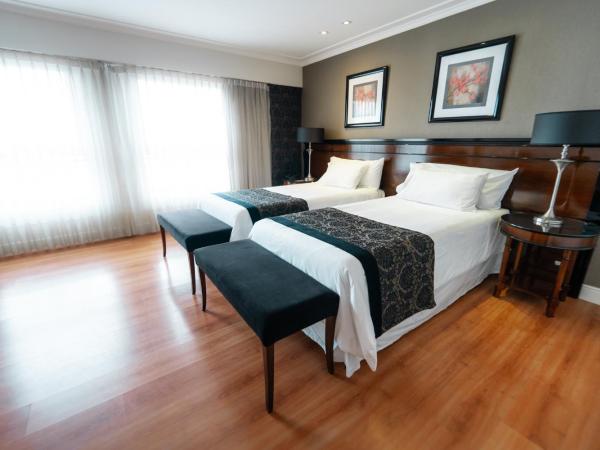 Amérian Executive Córdoba Hotel : photo 2 de la chambre chambre lits jumeaux premier