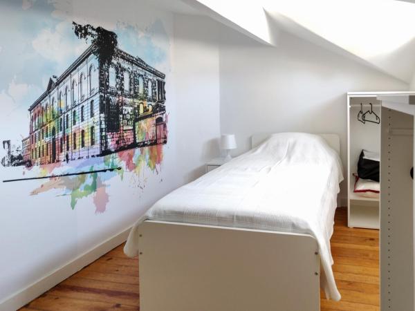 OLOPO : photo 1 de la chambre lit simple dans dortoir mixte