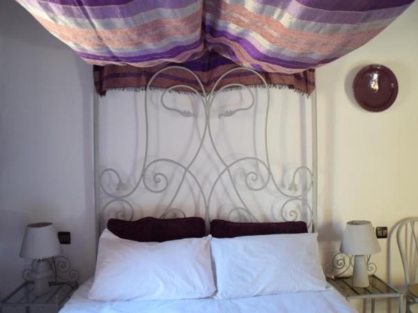 Riad Saltana : photo 4 de la chambre chambre triple avec baignoire