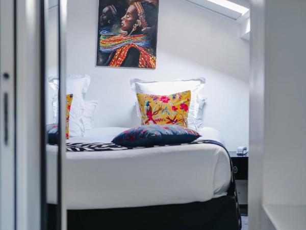 Le Manoir Hôtel : photo 7 de la chambre suite familiale mansardée