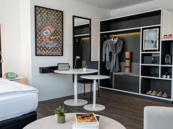 INNSiDE by Meliá Leipzig : photo 2 de la chambre chambre premium the innside - espace supplémentaire