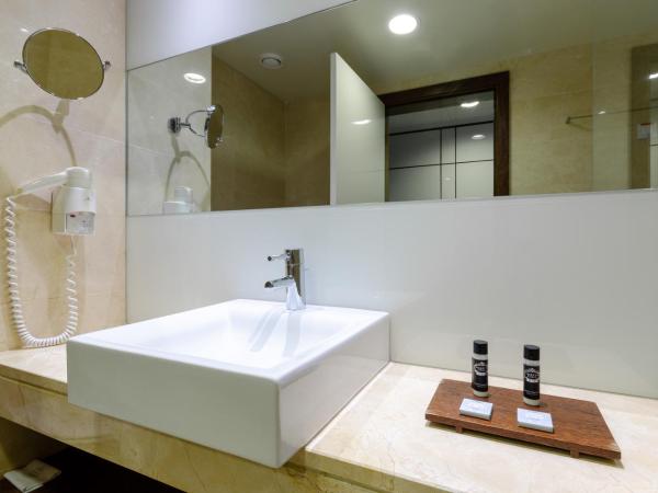 Olissippo Oriente : photo 10 de la chambre chambre double ou lits jumeaux avec lit d'appoint (3 adultes)