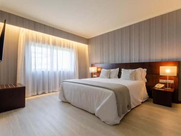 Olissippo Oriente : photo 7 de la chambre chambre double ou lits jumeaux avec lit d'appoint (2 adultes + 1 enfant)