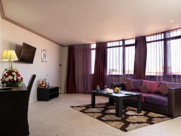 Blue Sea Le Printemps : photo 4 de la chambre suite deluxe avec lit king-size