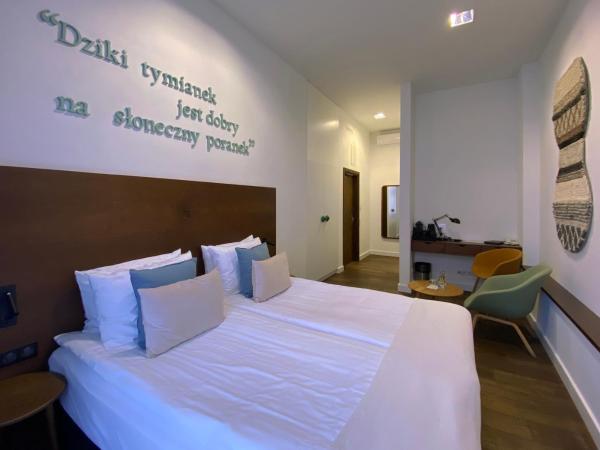 Apartamenty Sowa Toruń : photo 10 de la chambre chambre double ou lits jumeaux