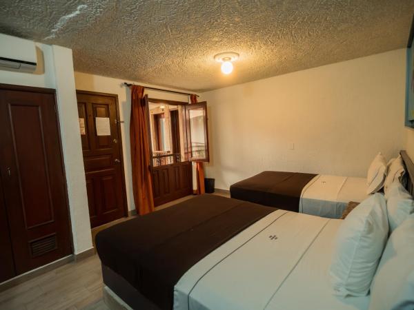 Hotel Don Quijote Plaza - Guadalajara Centro Historico : photo 5 de la chambre chambre double avec 2 lits doubles