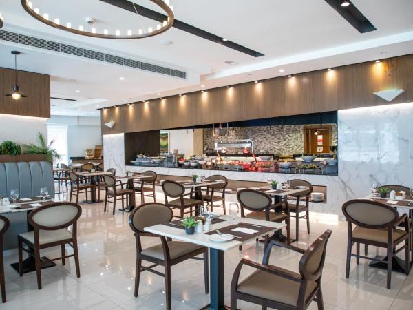 Elite Byblos Hotel : photo 3 de la chambre chambre lit king-size classique