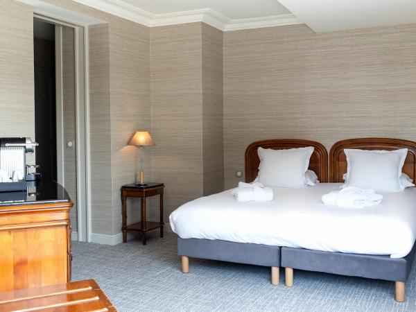 Le Relais Saint Michel : photo 2 de la chambre chambre lits jumeaux saint-michel - vue sur intérieur