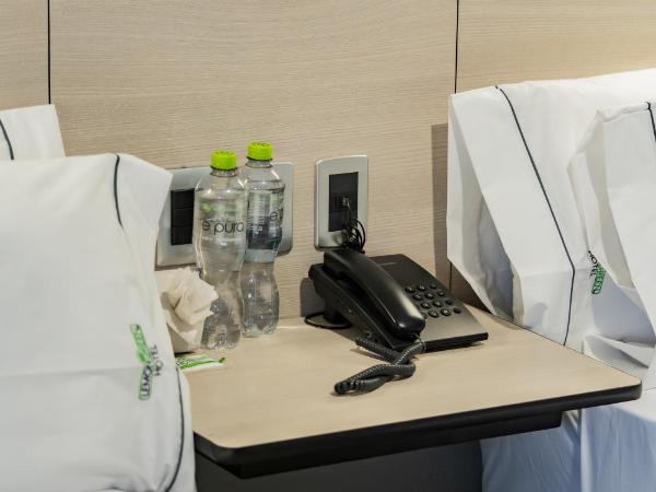 HOTEL LEMON GREEN -Zona Expo Frente al Centro de Convenciones : photo 3 de la chambre chambre lits jumeaux