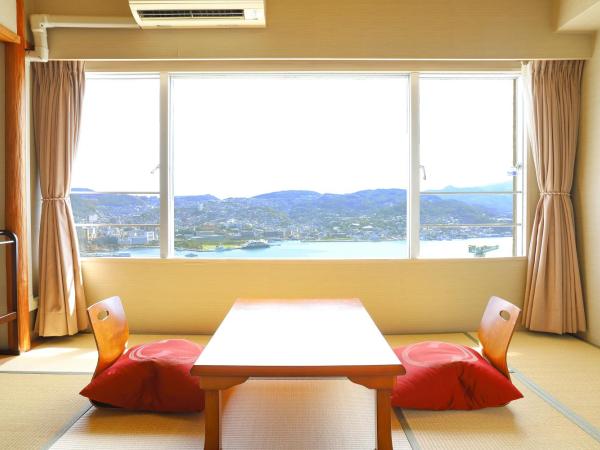 Ooedo Onsen Monogatari Nagasaki Hotel Seifu : photo 3 de la chambre deluxe twin room with tatami area with view - non-smoking