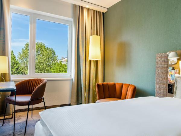 Motel One Wien-Prater : photo 9 de la chambre chambre lit queen-size 