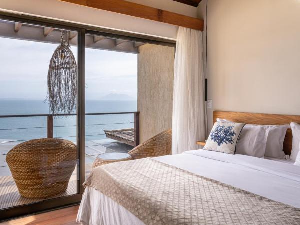 Casa Mirador Boutique Hotel : photo 4 de la chambre chambre lit king-size - vue sur mer