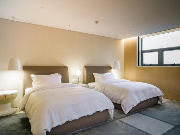 The Sifang Hotel Nanjing, Autograph Collection : photo 2 de la chambre chambre lits jumeaux familiale
