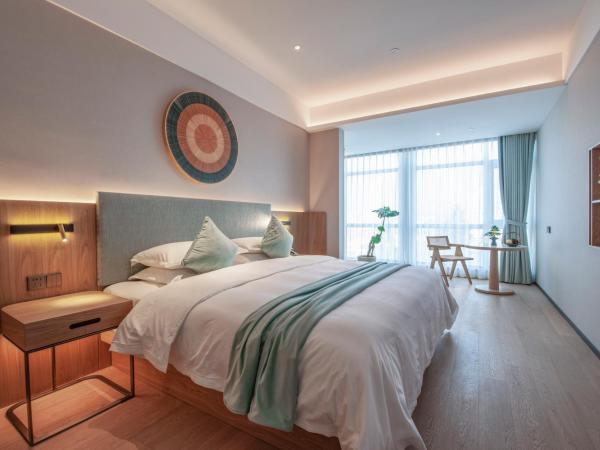 SSAW Boutique Hotel Zhijiang : photo 1 de la chambre chambre lit king-size deluxe