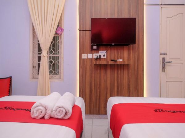 RedDoorz At Pondok Eyang Obi Sleman : photo 10 de la chambre chambre lits jumeaux deluxe