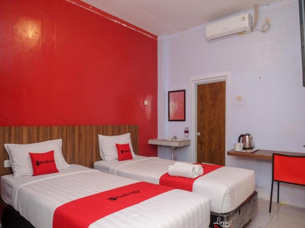 RedDoorz At Pondok Eyang Obi Sleman : photo 6 de la chambre chambre lits jumeaux deluxe