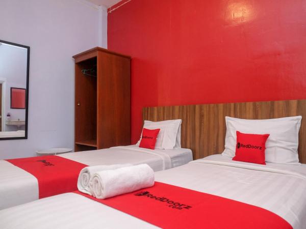 RedDoorz At Pondok Eyang Obi Sleman : photo 8 de la chambre chambre lits jumeaux deluxe
