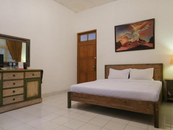 RedDoorz at Griya Cemara Homestay Yogyakarta : photo 3 de la chambre suite deluxe