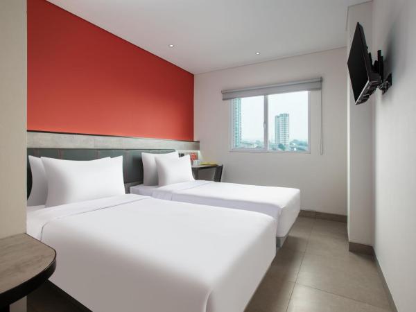 Amaris Hotel Kalimalang : photo 1 de la chambre chambre lits jumeaux smart