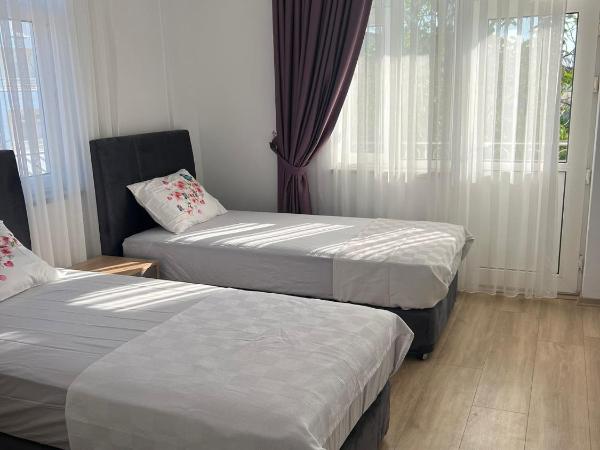 Asimado Hotel : photo 1 de la chambre chambre triple avec balcon