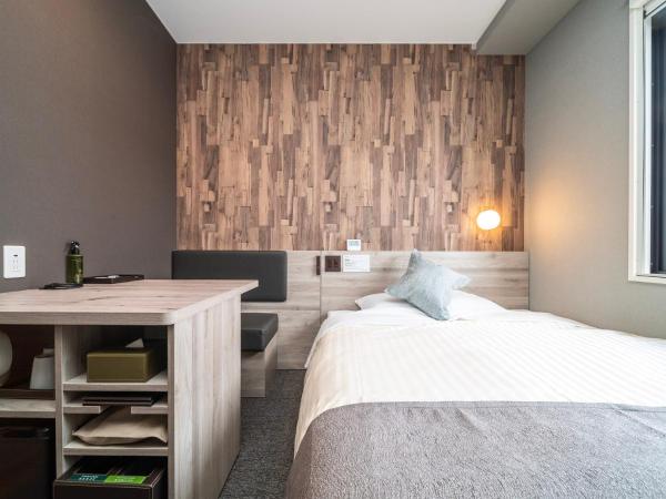 Super Hotel Premier Namba Shinsaibashi Natural Hot Spring : photo 5 de la chambre chambre double standard