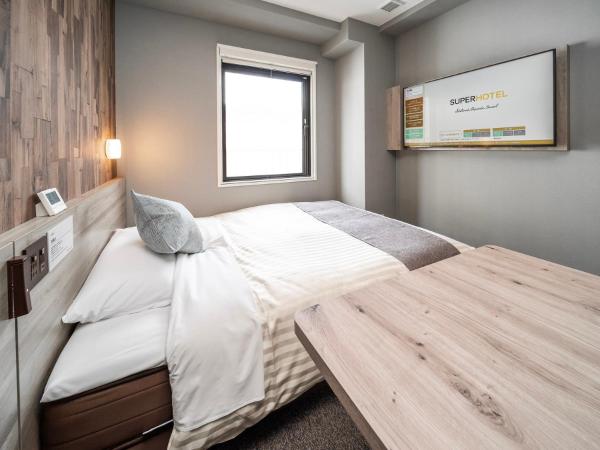 Super Hotel Premier Namba Shinsaibashi Natural Hot Spring : photo 6 de la chambre chambre double standard