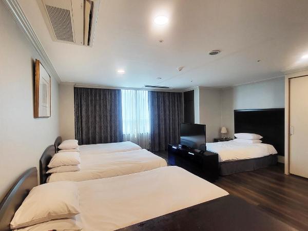 Ramada Hotel and Suites Seoul Namdaemun : photo 1 de la chambre hébergement quadruple premier