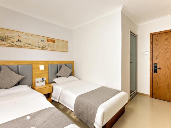 Happy Dragon Hotel - close to Forbidden City&Wangfujing Street&free coffee &English speaking,Newly renovated with tour service : photo 1 de la chambre chambre lits jumeaux