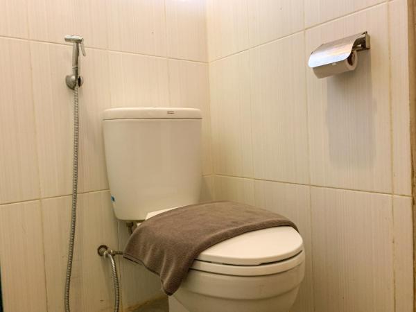 Urbanview Sasono Putro Condoongcatur by RedDoorz : photo 6 de la chambre chambre lits jumeaux deluxe