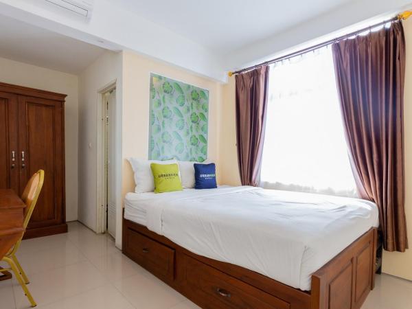 Urbanview Erga Family Residence Syariah Surabaya by RedDoorz : photo 8 de la chambre chambre supérieure lit queen-size