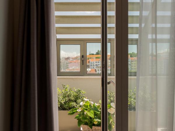 Hotel Dom Carlos Liberty : photo 7 de la chambre chambre double ou lits jumeaux de luxe avec terrasse privée