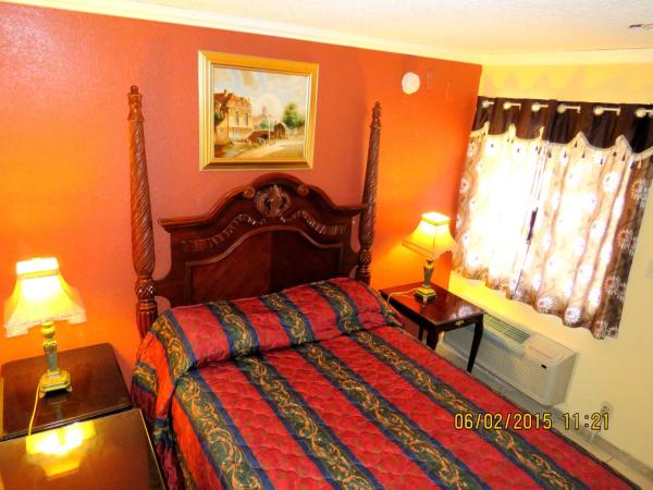 Central Inn Motel : photo 4 de la chambre chambre lit queen-size deluxe