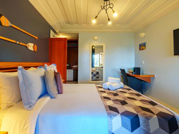 Pousada Santorini : photo 3 de la chambre chambre double avec baignoire spa