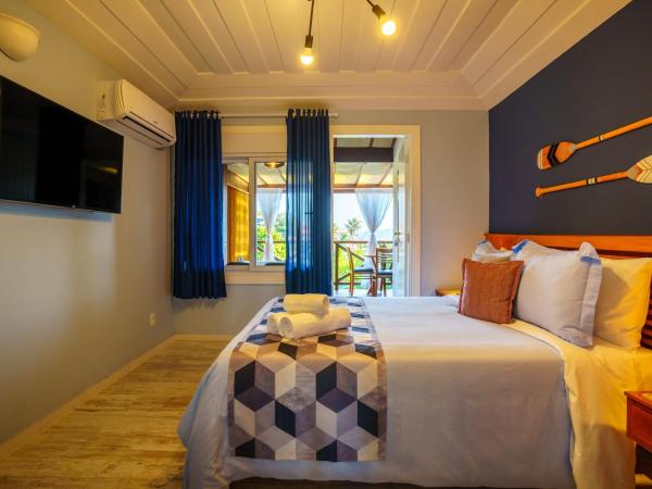 Pousada Santorini : photo 5 de la chambre chambre double avec baignoire spa