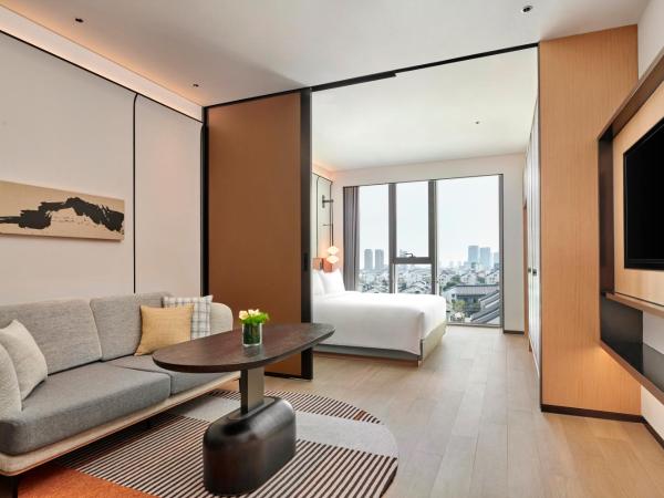 Artyzen Habitat Suzhou : photo 2 de la chambre habitat city view king room