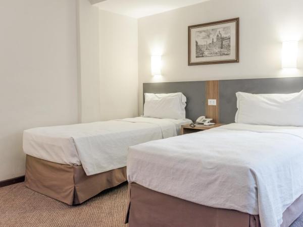 Lancaster Hotel by Castelo Itaipava : photo 4 de la chambre chambre lits jumeaux