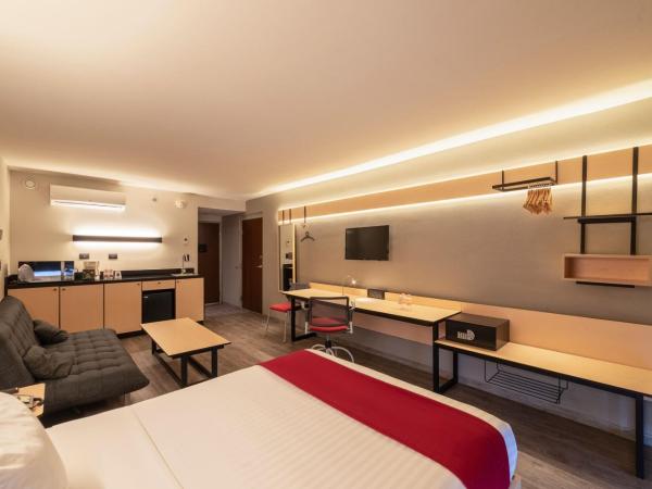 City Express Plus by Marriott Guadalajara Palomar : photo 1 de la chambre chambre lit queen-size supérieure avec canapé-lit