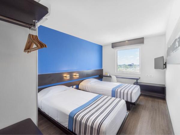 City Express Junior by Marriott Merida Altabrisa : photo 2 de la chambre chambre lits jumeaux