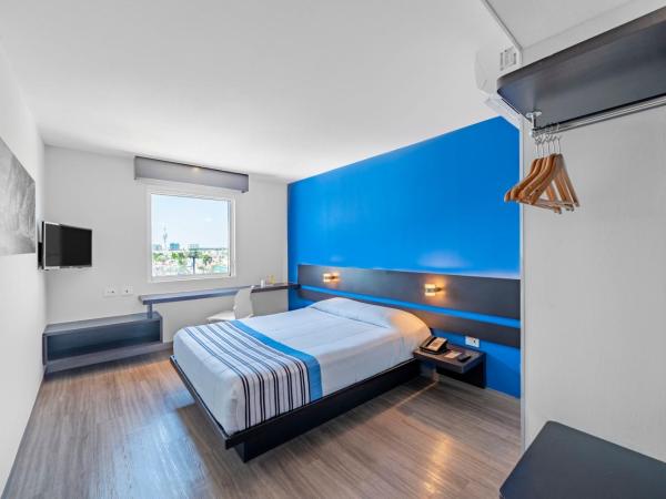 City Express Junior by Marriott Merida Altabrisa : photo 2 de la chambre chambre lit queen-size 